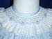 blue-smocked-bishop-closeup